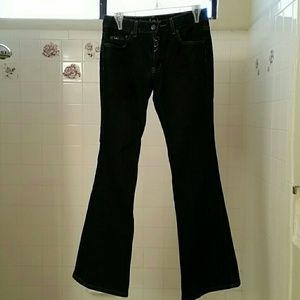 Jeans with rhinestone rings.